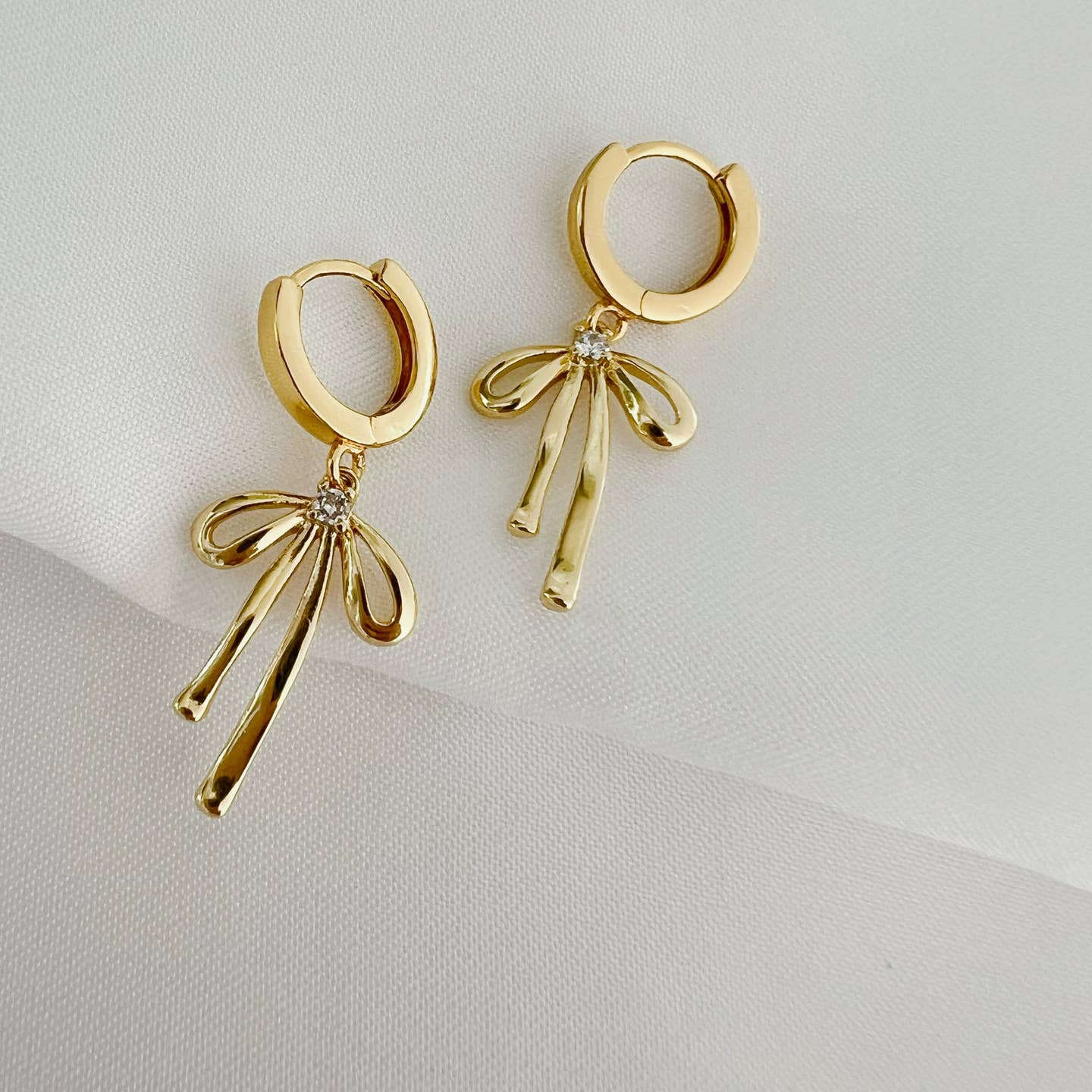Desert Lux Bow Ribbon Huggie Hoops Gold Filled Earrings available in Joshua Tree at JT Trading Post