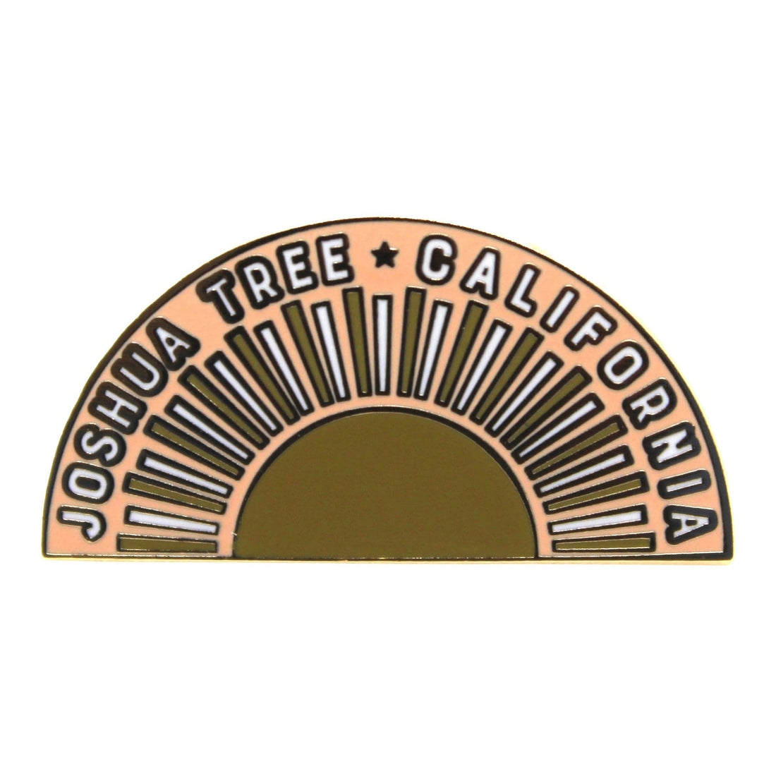 A gold and white enamel pin with the text 'Joshua Tree California' with a sun design.