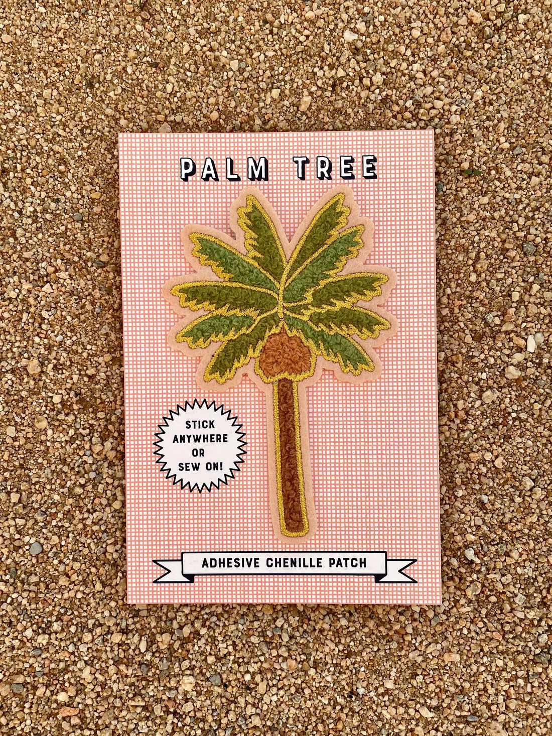 A palm tree chenille patch with gold embroidery on a pink card with text that reads 'Palm Tree' and 'ADHESIVE CHENILLE PATCH'.