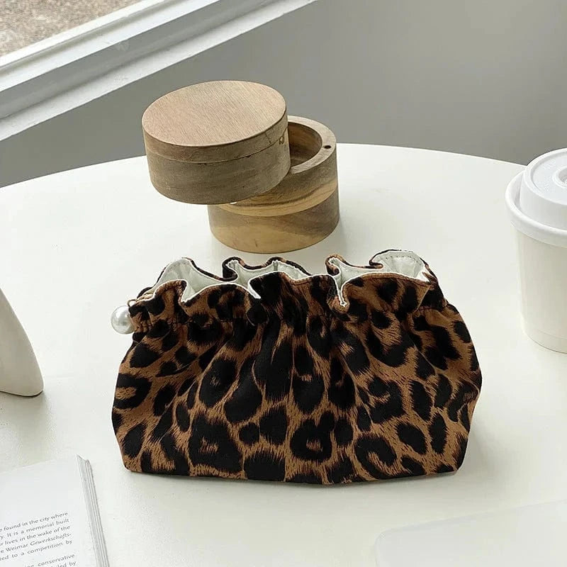 The Nomadic People Leopard Luxe Cosmetic Bag available in Joshua Tree at JT Trading Post